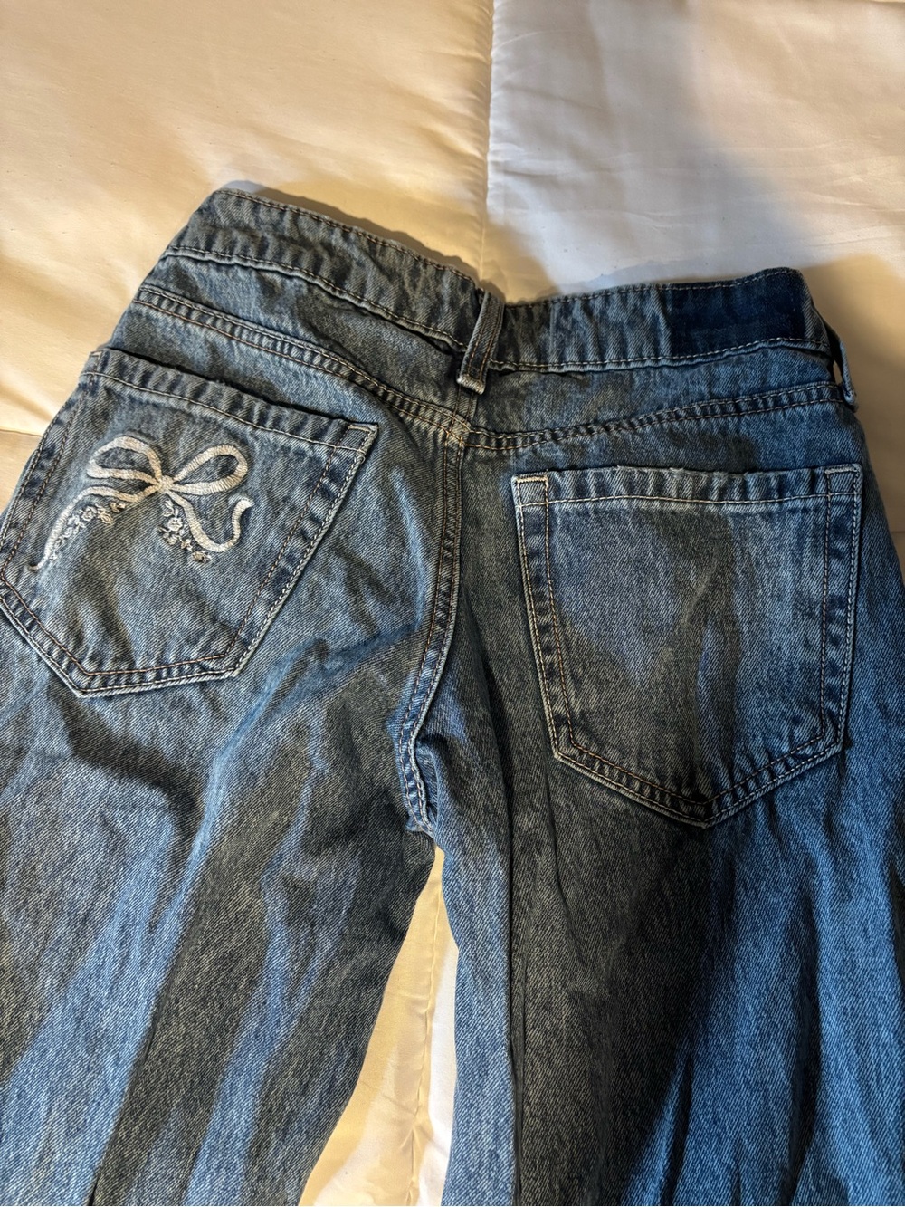 Hollister  Blue low rise baggy  Jeans with Embroidered Bow
